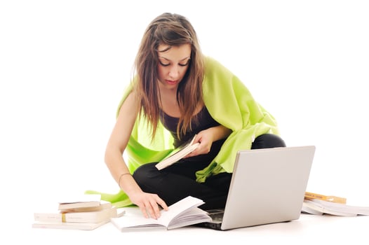 one young girl work on laptop isolated on white photo