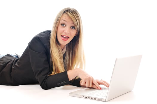 one young girl work on laptop isolated on white photo