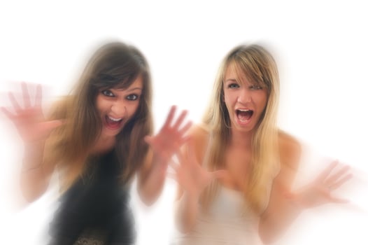 Women screaming on white photo
