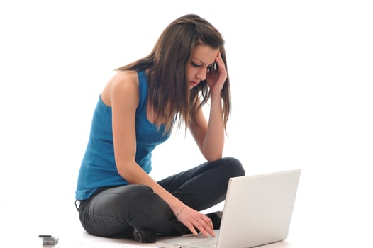 young girl work on laptop photo