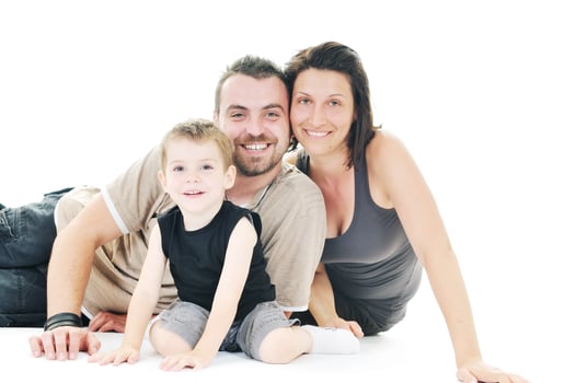 happy young family isolated on white photo
