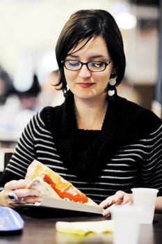woman eat pizza food at restaurant photo