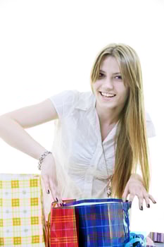 happy young adult women  shopping with colored bags photo