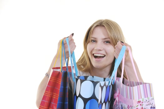 happy young adult women  shopping with colored bags photo