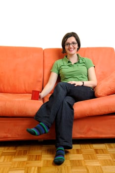 young woman eat popcorn and watching tv photo