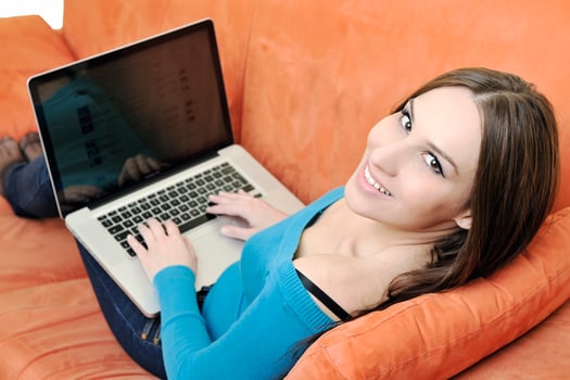 one young woman working on laptop photo