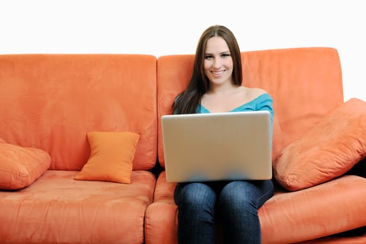 one young woman working on laptop photo
