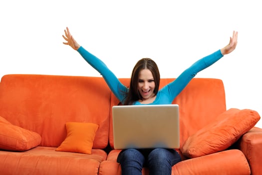 woman using a laptop computer at home photo