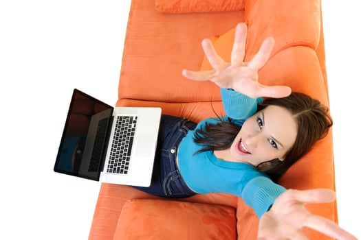 woman using a laptop computer at home photo
