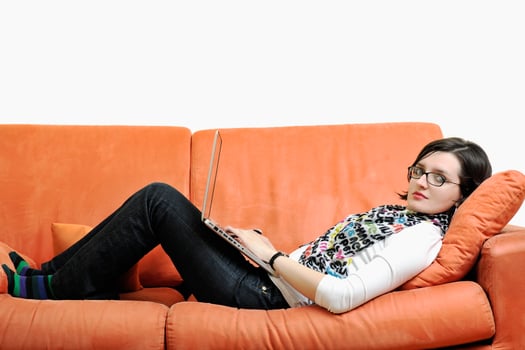 one young woman working on laptop photo
