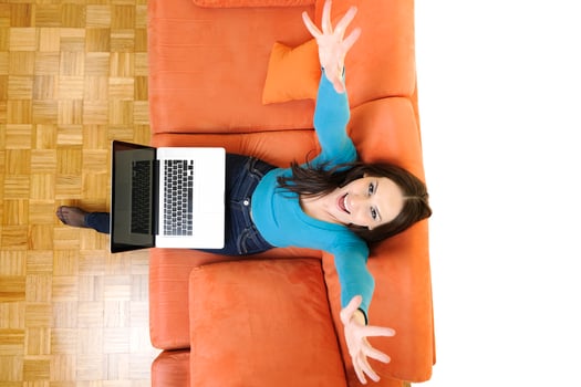 woman using a laptop computer at home photo