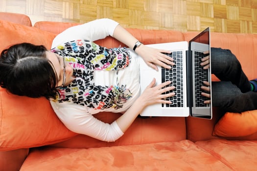 one young woman working on laptop photo