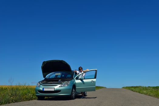 woman with broken car photo