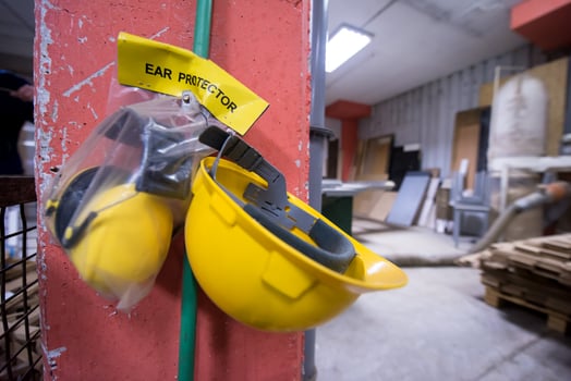 standard security equipment yellow helmet and ears protection photo