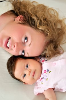young mother and baby relaxing photo