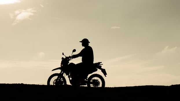 Tourists with motorcycles, motocross. Adventure tourists on motorcycles. men's holiday event ideas photo