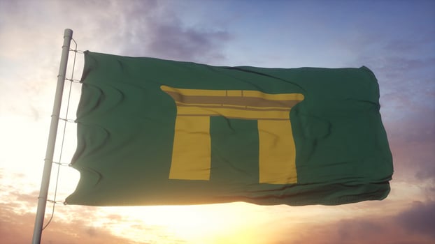 Qena flag, Egypt, waving in the wind, sky and sun background. 3d illustration photo