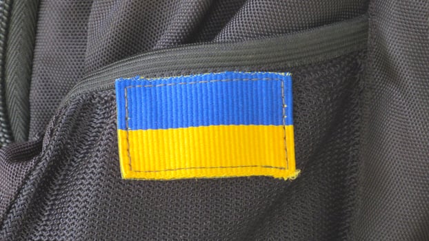 Ukraine flag on backpack photo