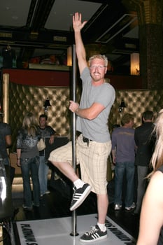 Jake Busey Showing his moves on a stripper pole made by Platinum StagesGBK MTV Movie Awards Gifting Suites Crimson  OperaLos Angeles  CAMay 30 20082008 photo
