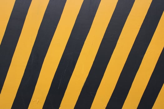 Black and yellow strip caution sign photo