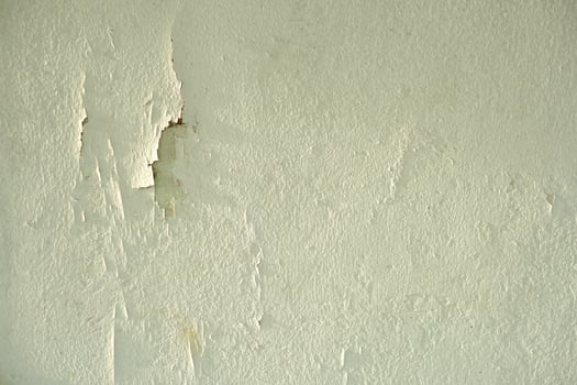 white cement wall background with discolored photo