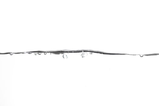 Splashing water surface with a white background photo