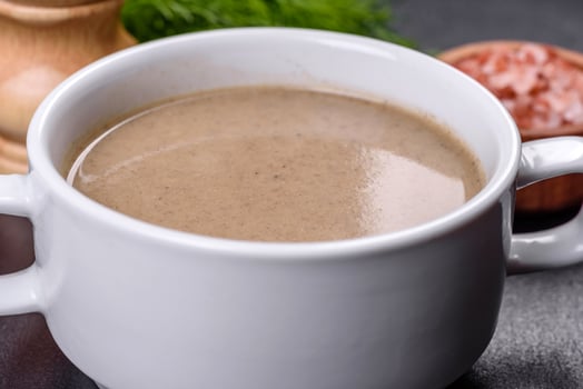 A delicious fresh, thick soup of mushroom puree with breadcrumbs, spices and herbs photo