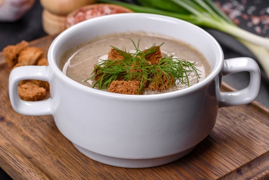 A delicious fresh, thick soup of mushroom puree with breadcrumbs, spices and herbs photo