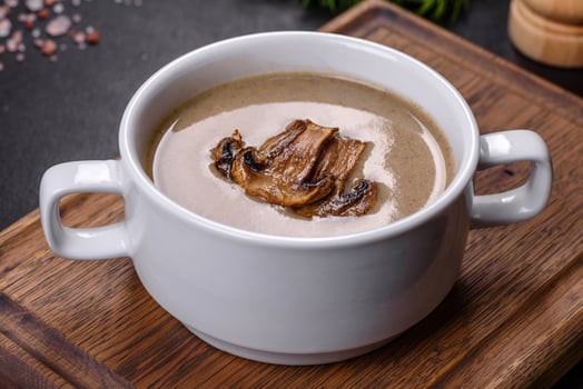 A delicious fresh, thick soup of mushroom puree with breadcrumbs, spices and herbs photo