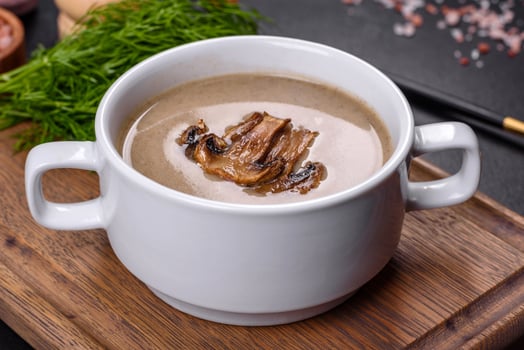 A delicious fresh, thick soup of mushroom puree with breadcrumbs, spices and herbs photo