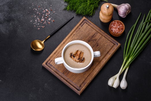A delicious fresh, thick soup of mushroom puree with breadcrumbs, spices and herbs photo