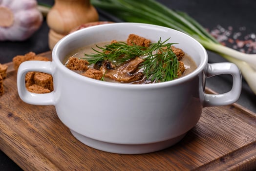 A delicious fresh, thick soup of mushroom puree with breadcrumbs, spices and herbs photo