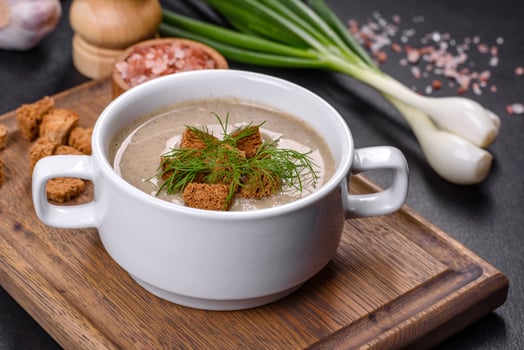 A delicious fresh, thick soup of mushroom puree with breadcrumbs, spices and herbs photo