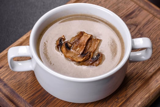 A delicious fresh, thick soup of mushroom puree with breadcrumbs, spices and herbs photo