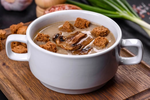 A delicious fresh, thick soup of mushroom puree with breadcrumbs, spices and herbs photo