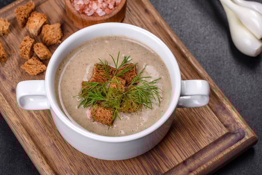 A delicious fresh, thick soup of mushroom puree with breadcrumbs, spices and herbs photo