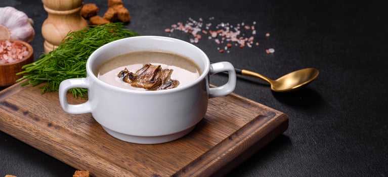 A delicious fresh, thick soup of mushroom puree with breadcrumbs, spices and herbs photo