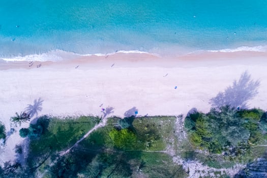 Phuket Thailand Aerial view sandy beach and waves Beautiful tropical sea in the morning summer season image by Aerial view drone shot, high angle view Top down photo