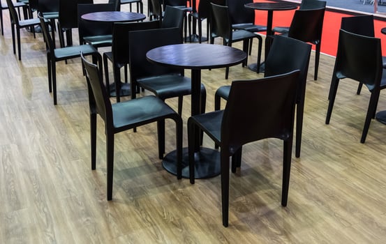 Modern black chair and circle wooden table set. photo