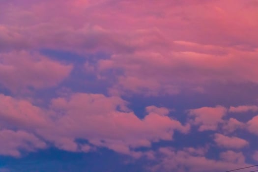 Amazing colorful pink violet blue and purple sunset sky panorama. photo