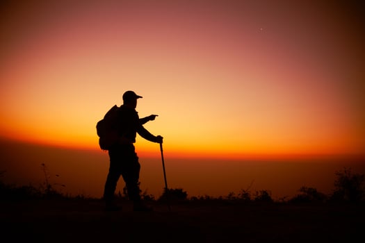 Hiker with backpack photo