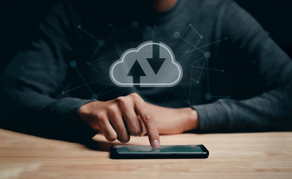 Man using smartphone with virtual cloud computing with connection line.Cloud computing system for sharing download and upload big data information. photo