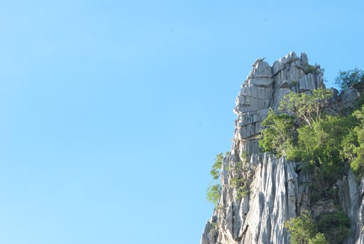 Rock moutain with blue sky in Nakhonsawan province, Thailand photo