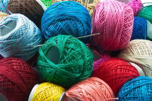 Bright colored yarn balls background photo
