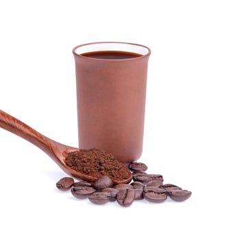 Coffee beans with ground coffee isolated on white background photo