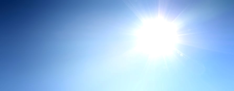 Blue sky during a sunny day with sunlight. photo