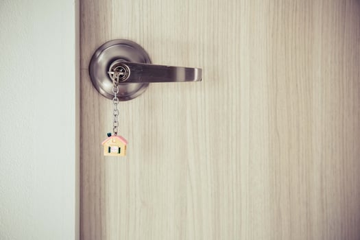 Open door with keys. photo