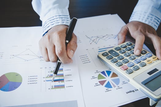 Business woman looking at charts photo
