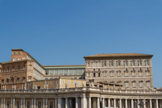 Buildings in Vatican, the Holy See within Rome, Italy. Part of Saint Peter's Basilica. photo