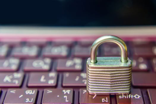Padlock on keyboard laptop photo